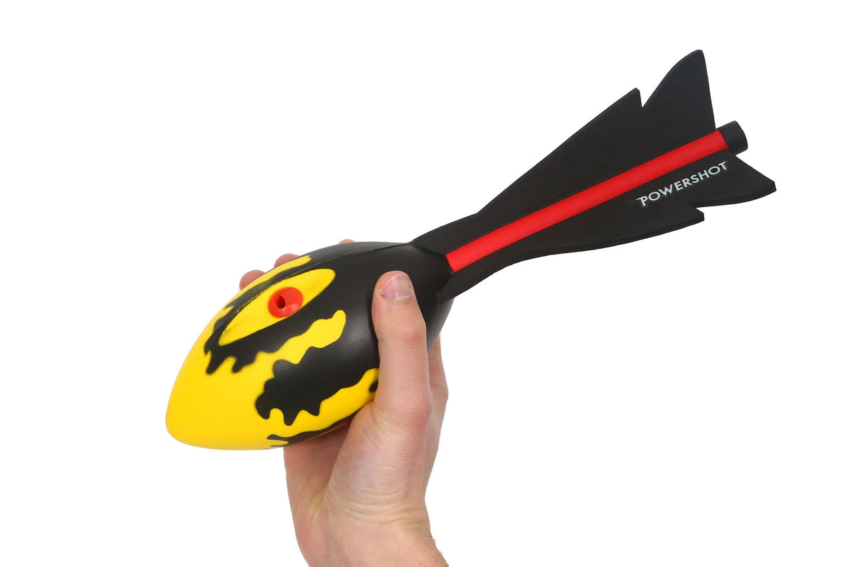 Javelin ball with integrated whistles