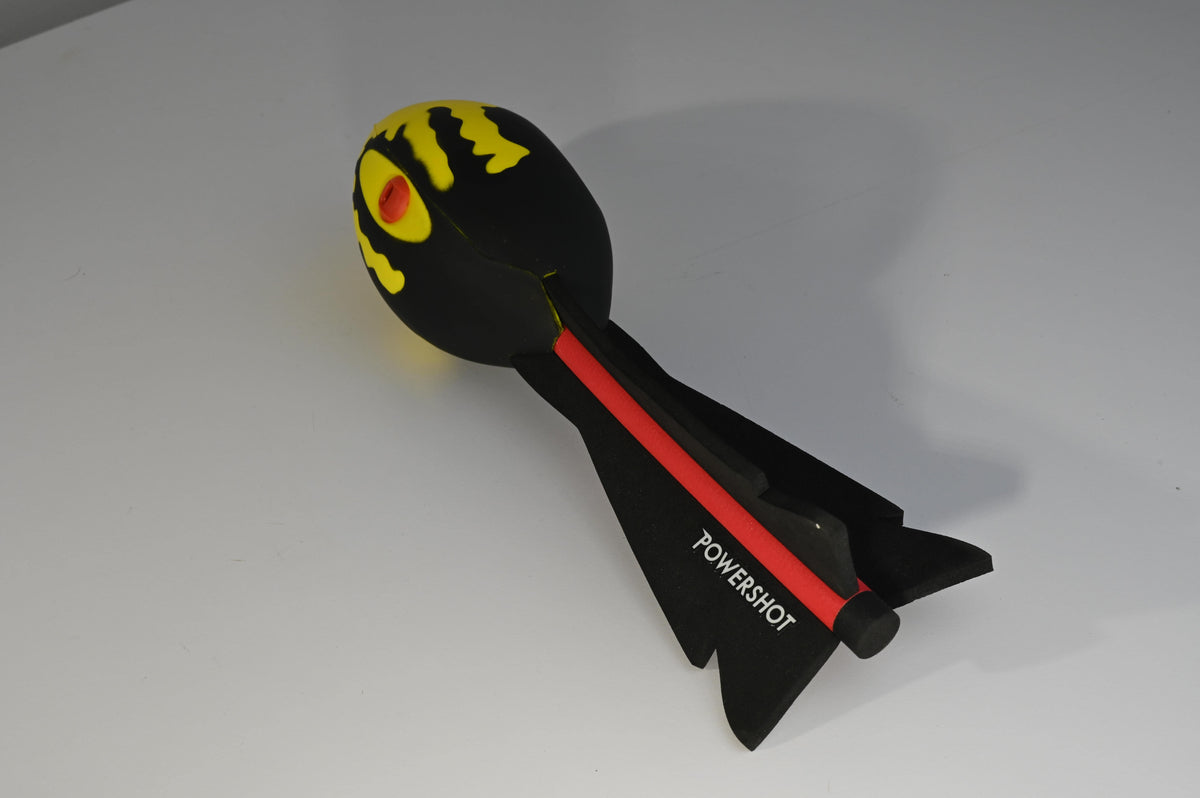 Javelin ball with integrated whistles