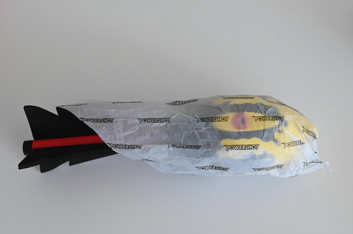 Javelin ball with integrated whistles